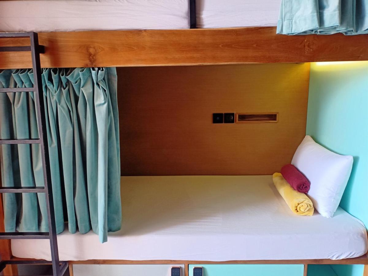 スミニャック Stellar Capsulesホステル エクステリア 写真 A bunk bed